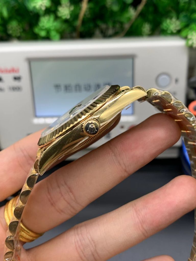 Golden Rolex Day-Date Crown